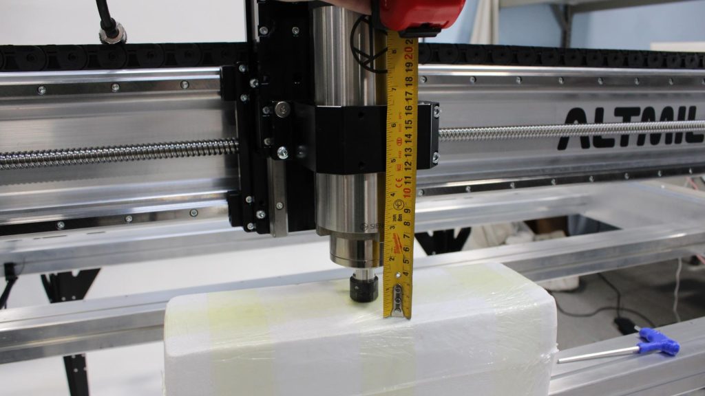 Step 1: Adjusting spindle height